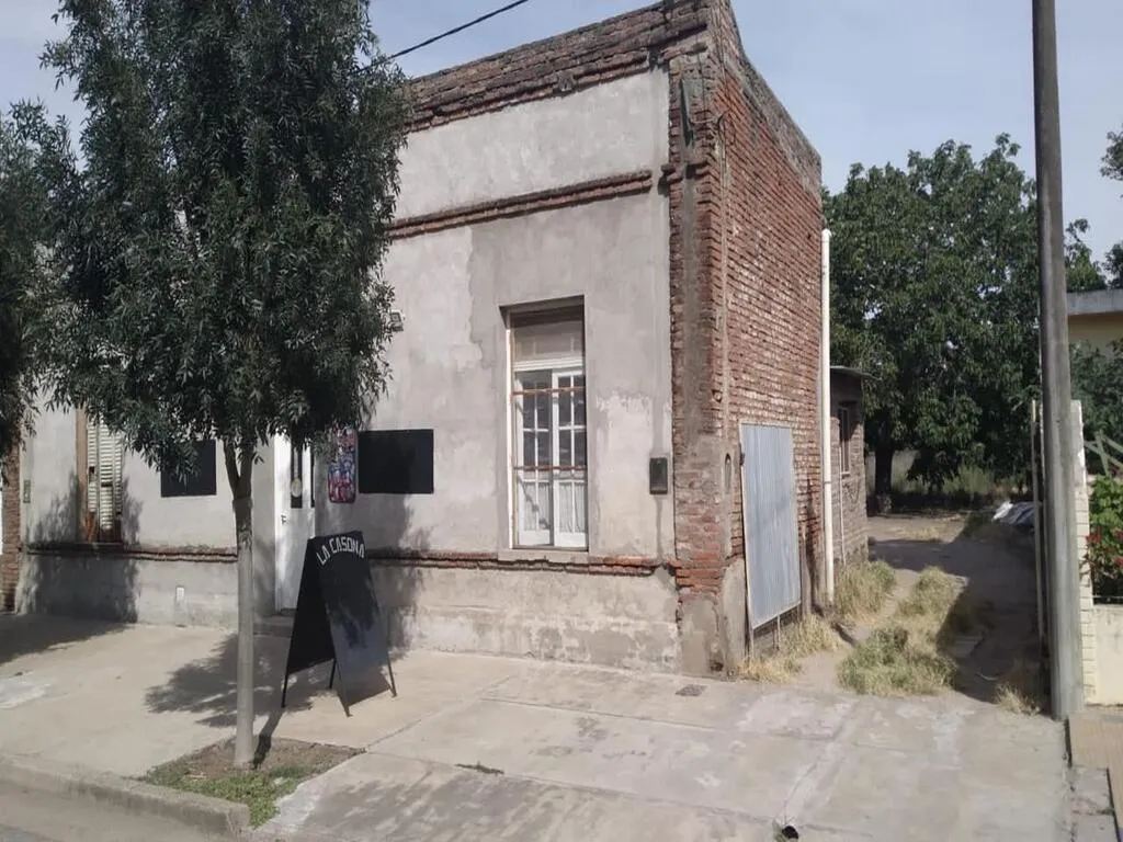 Local comercial y casa Calle Santa Fe 500